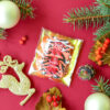 Целофановий пакетик “We wish a Merry Christmas/Різдвяний вінок” із золотою підкладкою та з клейкою стрічкою, 10*10 cм + 3 см